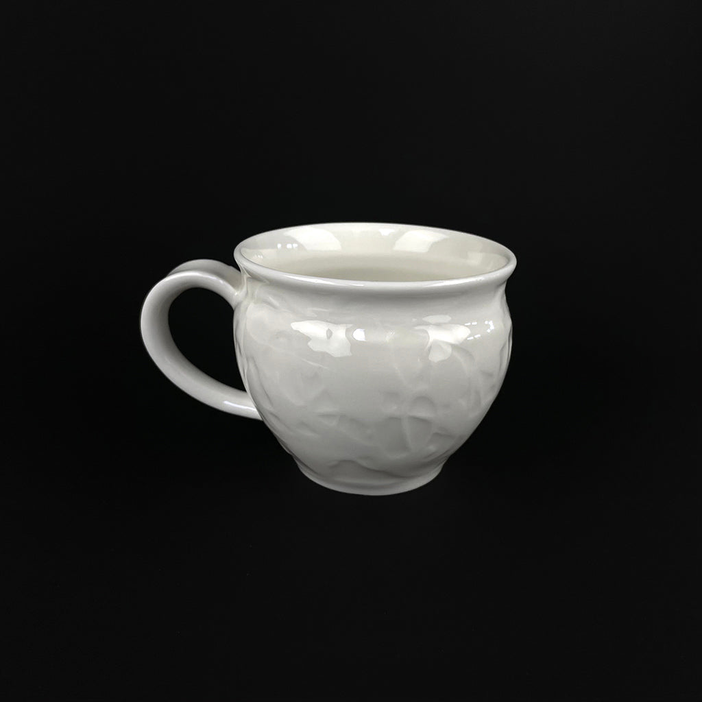 WHITE PORCELAIN CUP