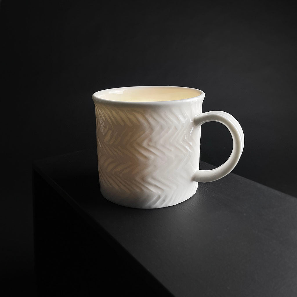 WHITE PORCELAIN CUP