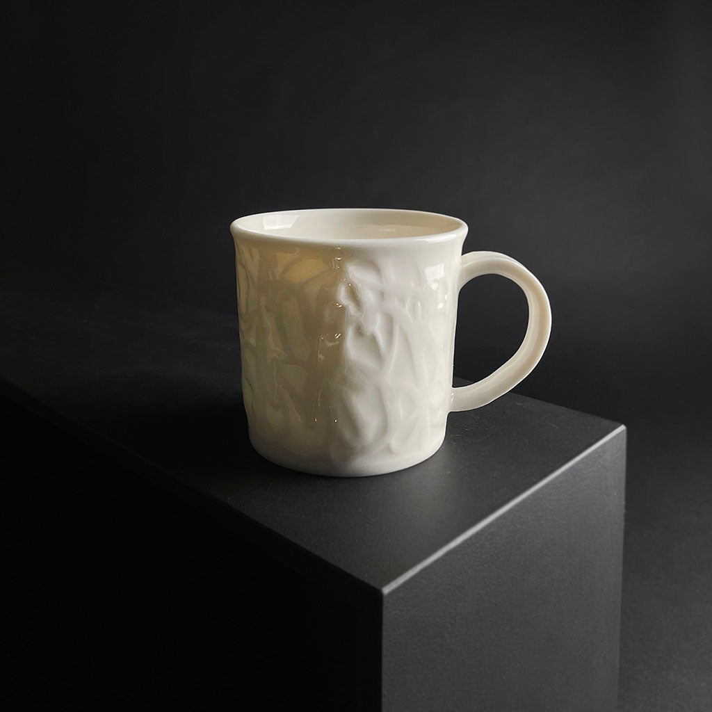 WHITE PORCELAIN CUP