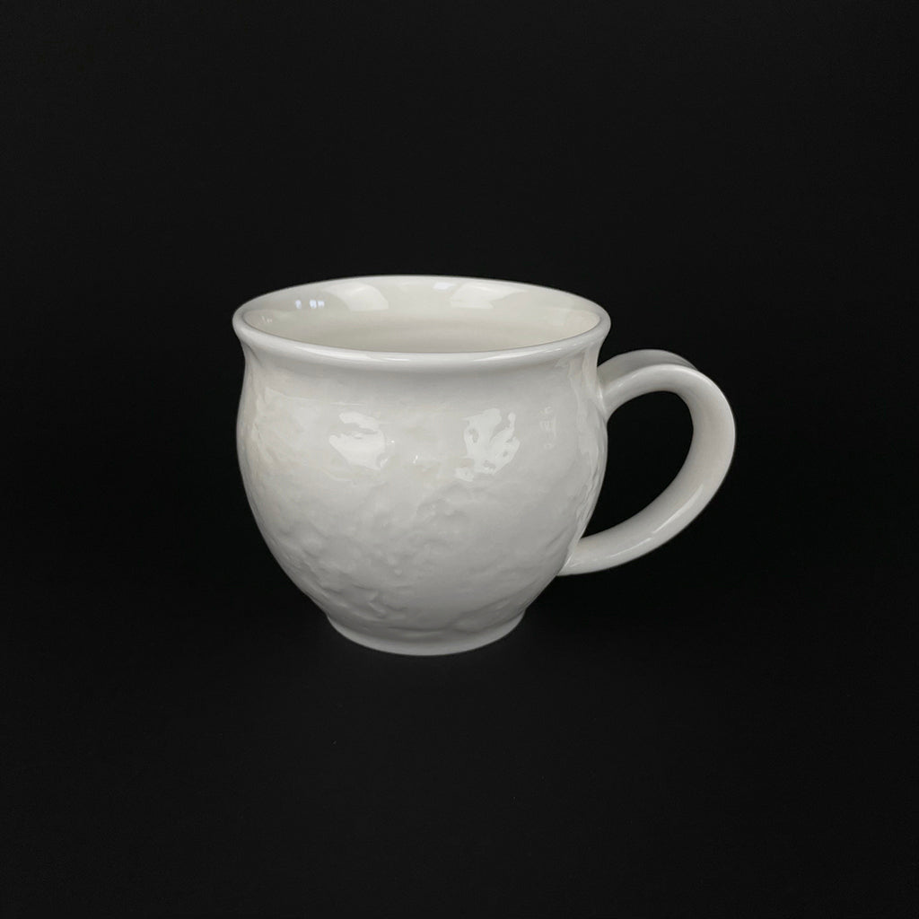 WHITE PORCELAIN CUP