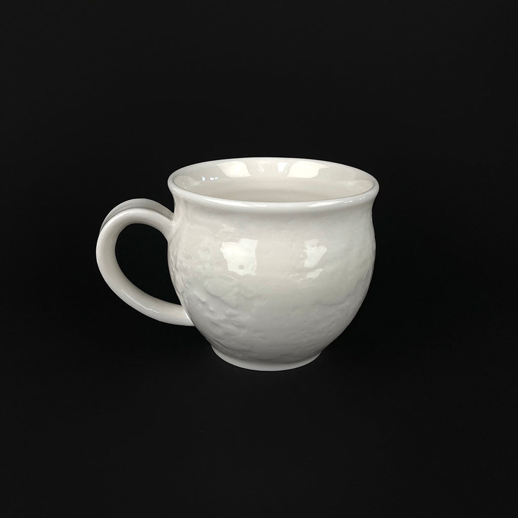 WHITE PORCELAIN CUP