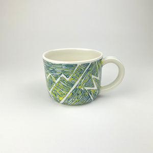 YELLOW AND TEAL PORCELAIN CUP